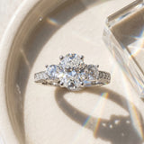 White gold Oval Three-Stone Diamond Ring with Pavé Band and Four-Prong Setting_60