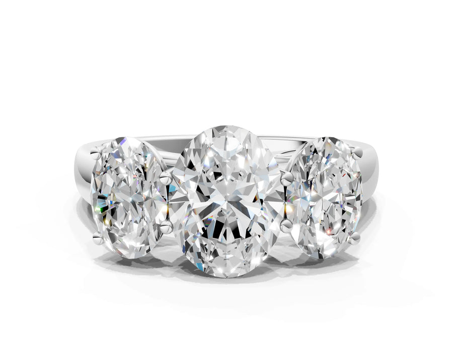 White gold Oval Three-Stone Diamond Ring with Prong Setting on a Classic Band