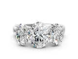White gold Oval Three-Stone Diamond Ring with Prong Setting on a Classic Band_23