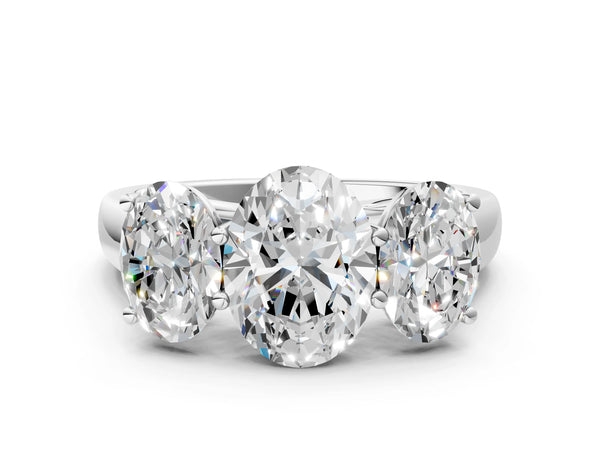 White gold Oval Three-Stone Diamond Ring with Prong Setting on a Classic Band
