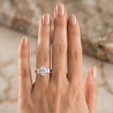 White gold Oval Three-Stone Diamond Ring with Prong Setting on a Classic Band_53