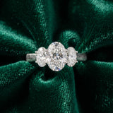 White gold Oval Three-Stone Diamond Ring with Prong Setting on a Classic Band_56