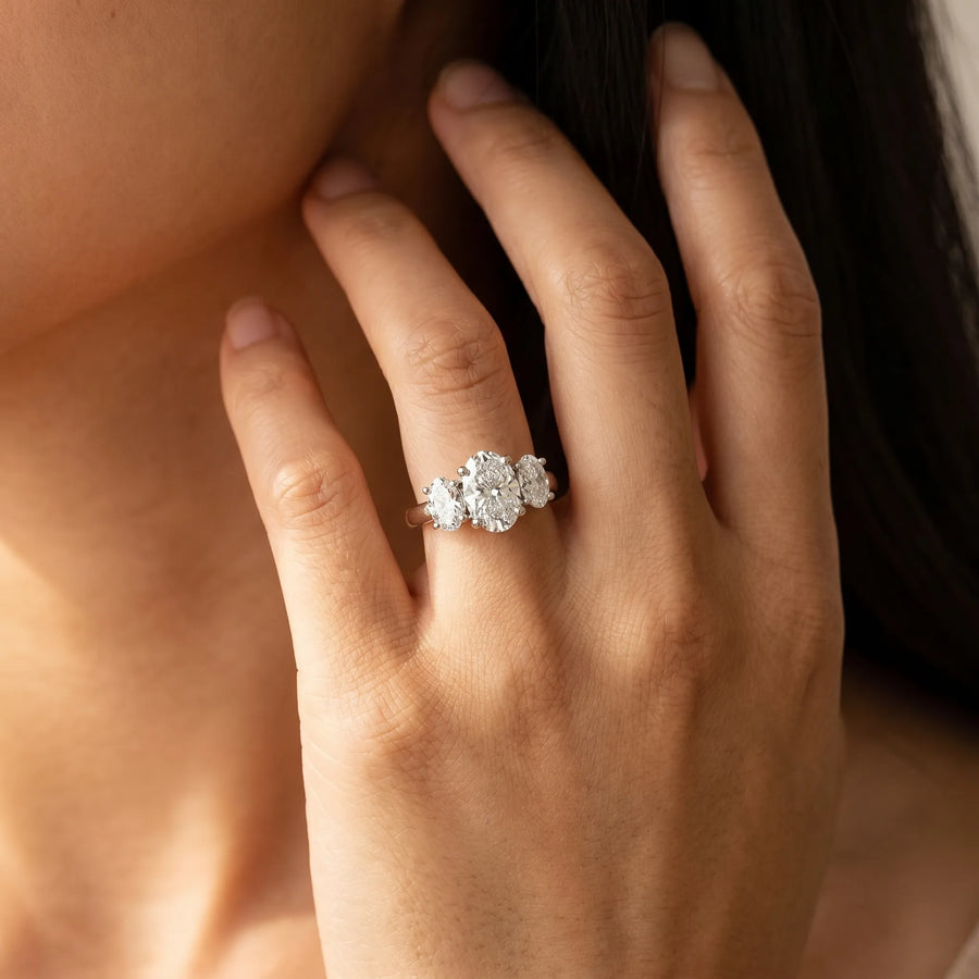 White gold Oval Three-Stone Diamond Ring with Solitaire Band and Four-Prong Setting