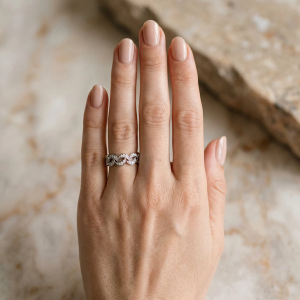 White gold Pavé Round Diamond Interlocking Eternity Band with Bezel Prong Setting