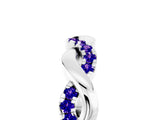 White gold Pavé Round Tanzanite Twist Eternity Band with Shared Prong Setting_47