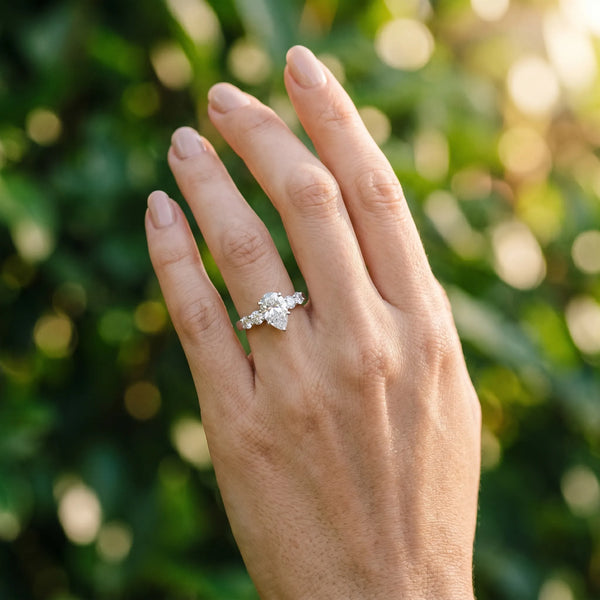 White gold Pear Brilliant Diamond Five-Stone Engagement Ring with Prong Setting on a Classic Band