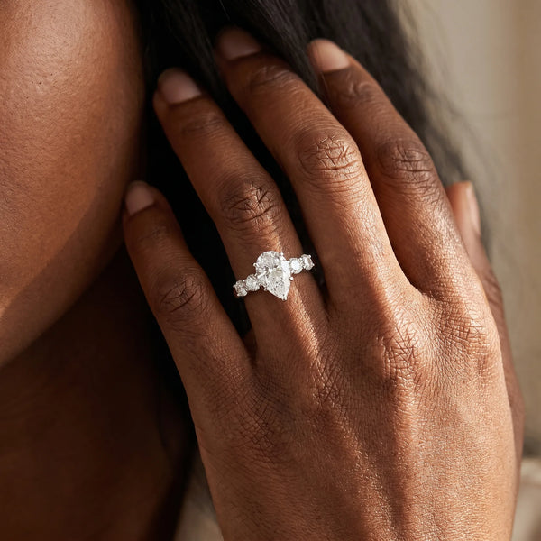 White gold Pear Brilliant Diamond Five-Stone Engagement Ring with Prong Setting on a Classic Band