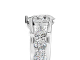 White gold Pear Brilliant Solitaire with Side Stones on a Pave Band and Four-Prong Setting_100