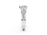 White gold Pear Brilliant Solitaire with Side Stones on a Pave Band and Four-Prong Setting_102