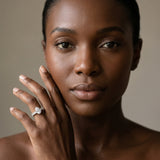 White gold Pear Brilliant Solitaire with Side Stones on a Pave Band and Four-Prong Setting_15