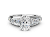 White gold Pear Brilliant Solitaire with Side Stones on a Pave Band and Four-Prong Setting_58