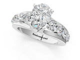 White gold Pear Brilliant Solitaire with Side Stones on a Pave Band and Four-Prong Setting_59