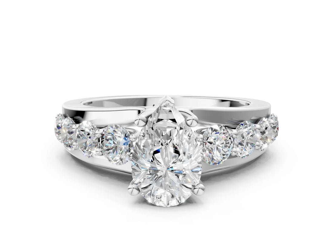 White gold Pear Brilliant Solitaire with Side Stones on a Pave Band and Four-Prong Setting_95