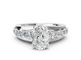 White gold Pear Brilliant Solitaire with Side Stones on a Pave Band and Four-Prong Setting_95