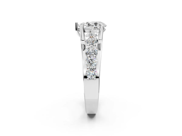 White gold Pear Brilliant Solitaire with Side Stones on a Pave Band and Four-Prong Setting
