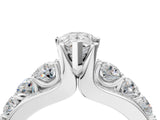White gold Pear Brilliant Solitaire with Side Stones on a Pave Band and Four-Prong Setting_99