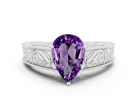 White gold Pear Cut Amethyst Solitaire Ring with Engraved Band and Four-Prong Setting