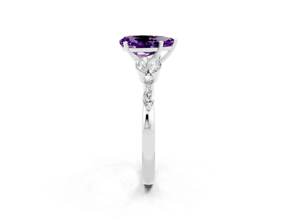 Platinum Pear Cut Amethyst Solitaire Ring with Side Stones and Four-Prong Setting