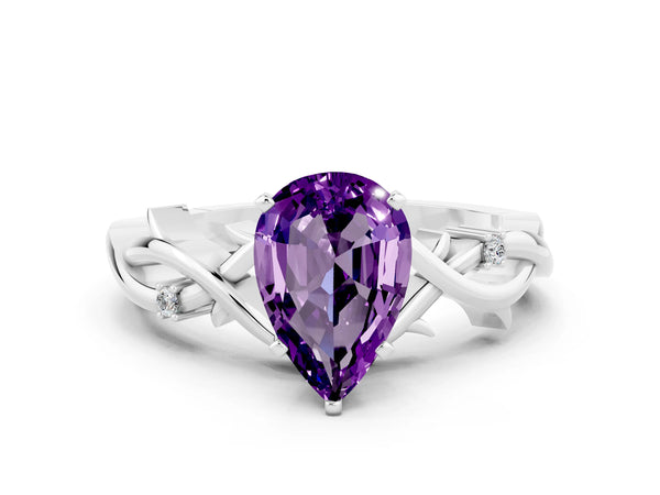 Silver Pear Cut Amethyst Solitaire Ring with Twisted Band and Prong Setting