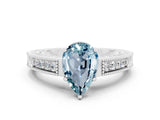 White gold Pear Cut Aquamarine Engagement Ring with Milgrain Channel Set Band and Prong Setting