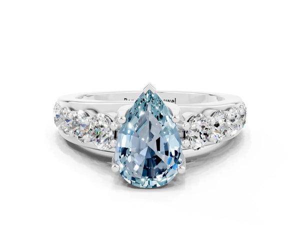 Silver Pear Cut Aquamarine Engagement Ring with Pavé Band and Four-Prong Setting