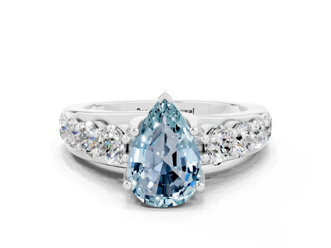 White gold Pear Cut Aquamarine Engagement Ring with Pavé Band and Four-Prong Setting