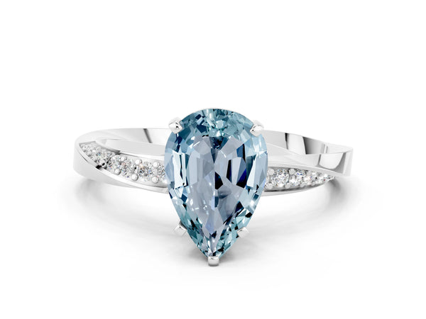 Silver Pear Cut Aquamarine Engagement Ring with Side Stone Accents and Four-Prong Setting