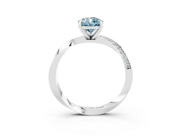 Platinum Pear Cut Aquamarine Engagement Ring with Side Stone Accents and Four-Prong Setting