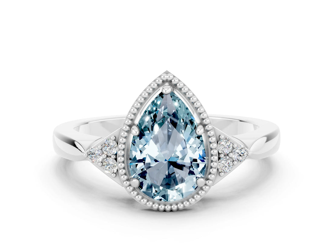 White gold Pear Cut Aquamarine Halo Ring with Tapered Band and Four-Prong Setting