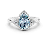 White gold Pear Cut Aquamarine Halo Ring with Tapered Band and Four-Prong Setting