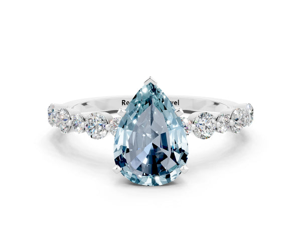 Platinum Pear Cut Aquamarine Prong Set Engagement Ring with Pavé Band