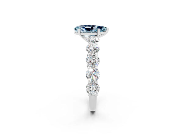 Platinum Pear Cut Aquamarine Prong Setting with Side Stones on a Pave Band