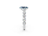 White gold Pear Cut Aquamarine Prong Setting with Side Stones on a Pave Band_2