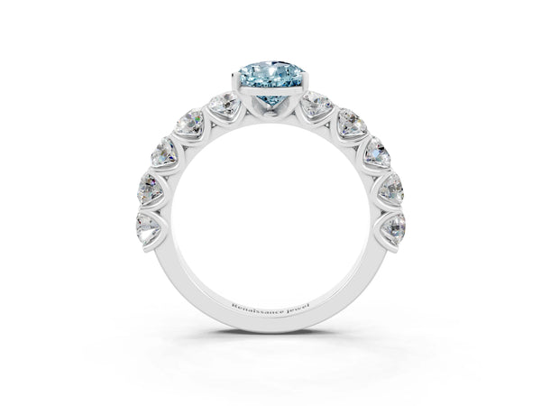 Platinum Pear Cut Aquamarine Prong Setting with Side Stones on a Pave Band