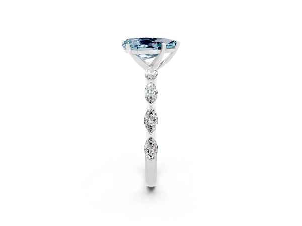 Platinum Pear Cut Aquamarine Ring with Marquise Side Stones and Prong Setting