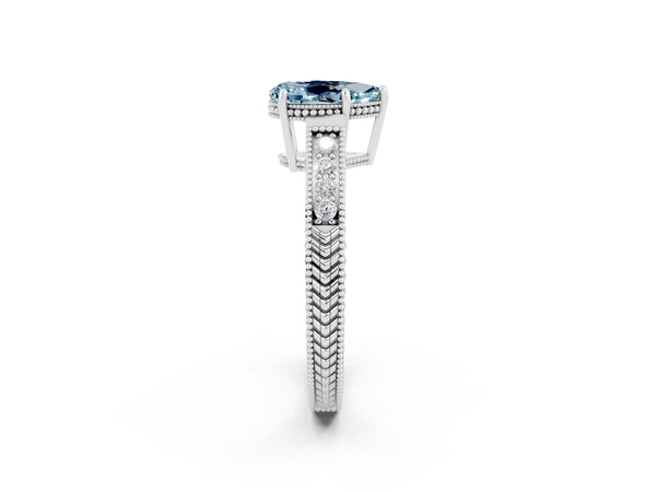 Silver Pear Cut Aquamarine Ring with Milgrain Pavé Band and Four-Prong Setting