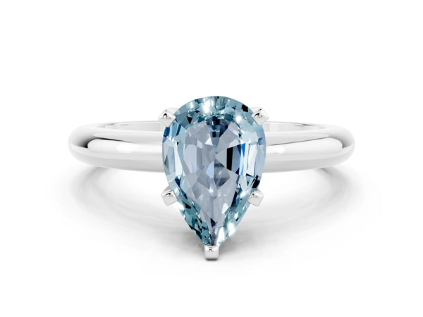 Silver Pear Cut Aquamarine Solitaire Engagement Ring with Round Band and Four-Prong Setting