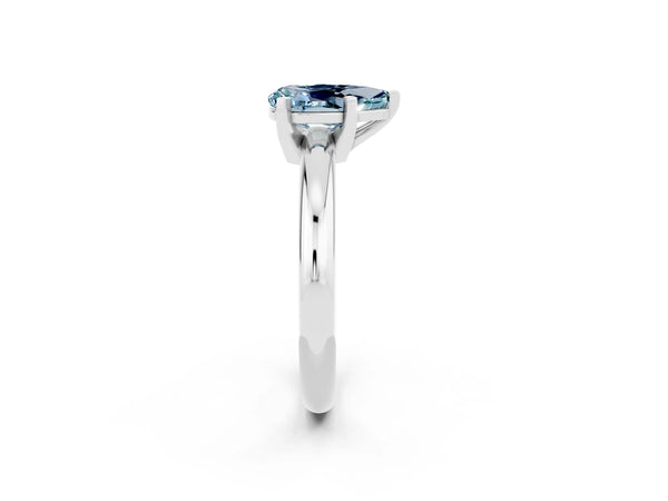 Platinum Pear Cut Aquamarine Solitaire Engagement Ring with Round Band and Four-Prong Setting