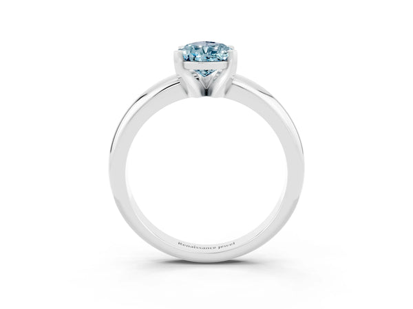 Platinum Pear Cut Aquamarine Solitaire Engagement Ring with Round Band and Four-Prong Setting