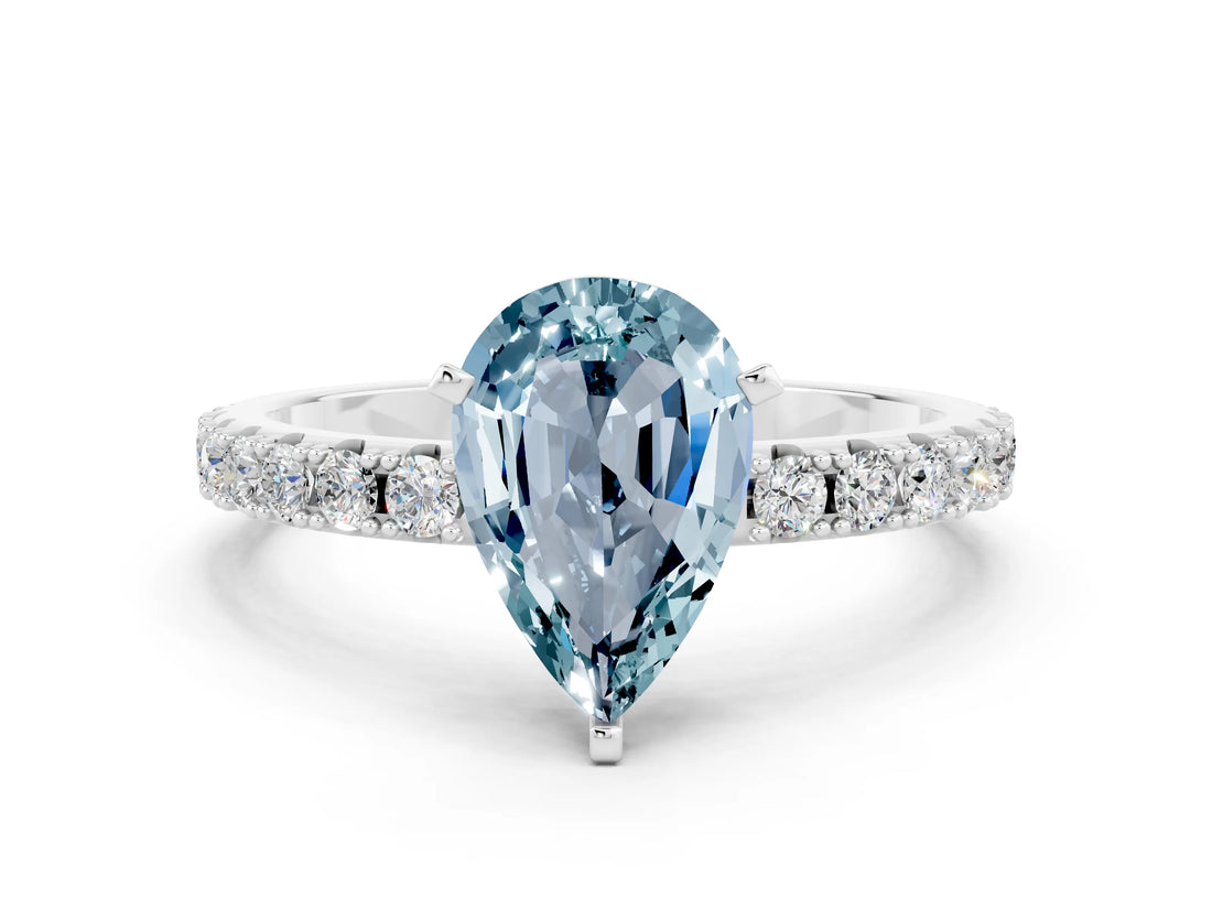 White gold Pear Cut Aquamarine Solitaire Pavé Band with Four-Prong Setting