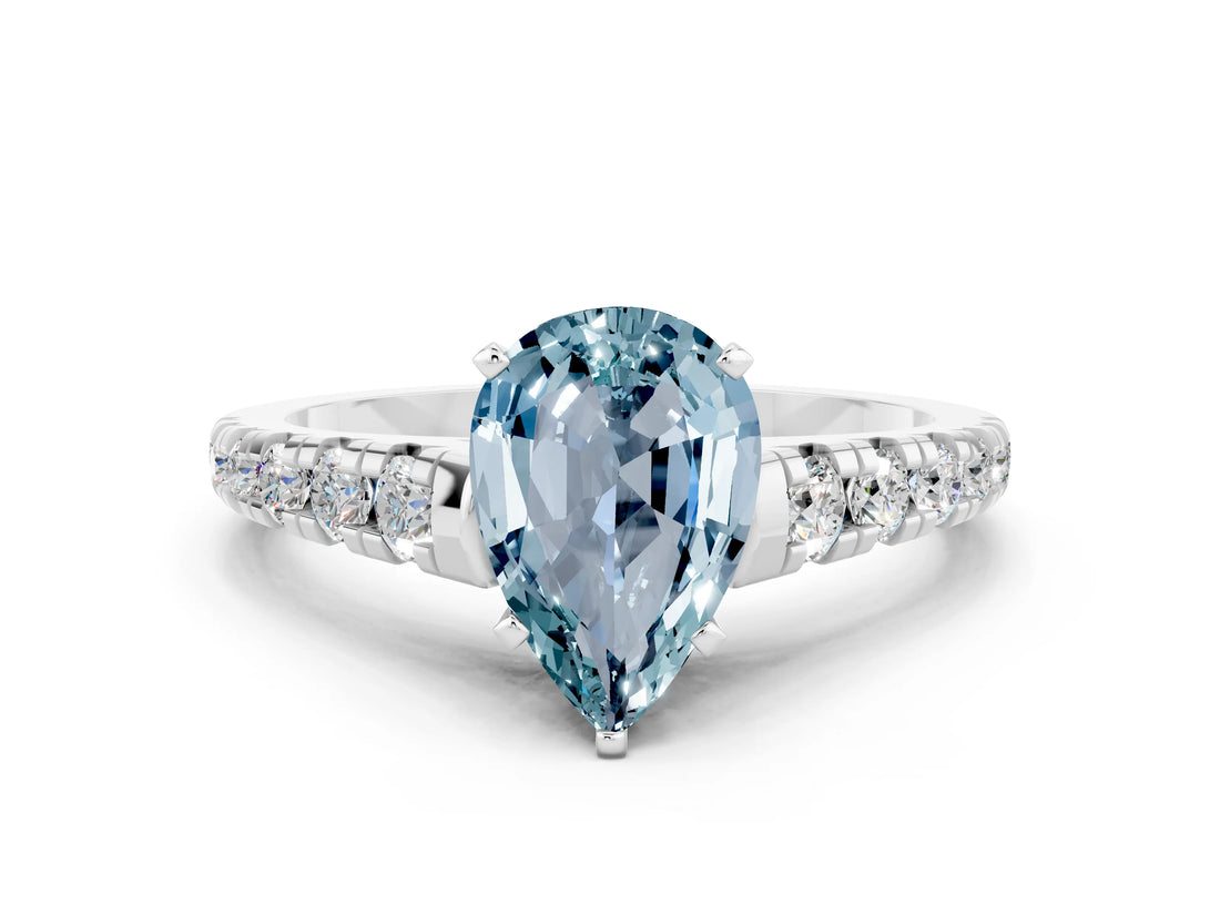 White gold Pear Cut Aquamarine Solitaire Ring with Cathedral Setting and Pavé Band