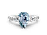 White gold Pear Cut Aquamarine Solitaire Ring with Cathedral Setting and Pavé Band