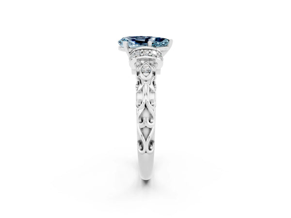 Silver Pear Cut Aquamarine Solitaire Ring with Filigree Band and Four-Prong Setting
