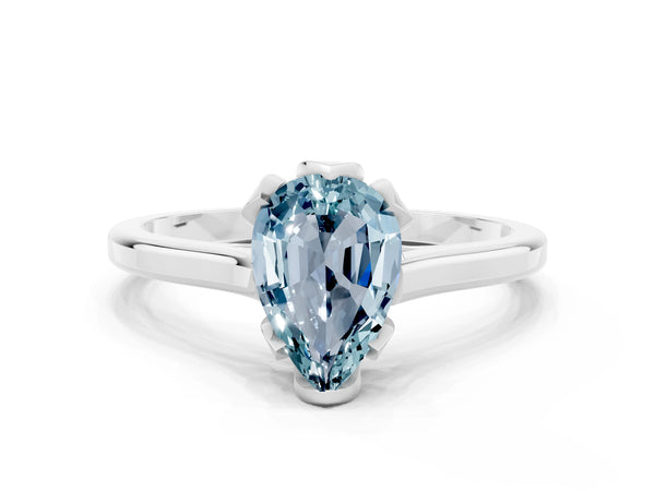 Silver Pear Cut Aquamarine Solitaire Ring with Flower Prong Setting and Classic Band