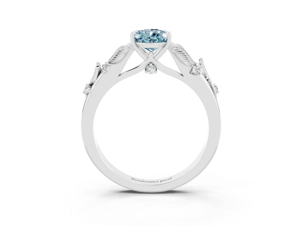 Silver Pear Cut Aquamarine Solitaire Ring with Leaf Motif Band and Four-Prong Setting