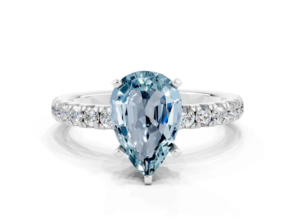 Silver Pear Cut Aquamarine Solitaire Ring with Pavé Accents and Four-Prong Setting