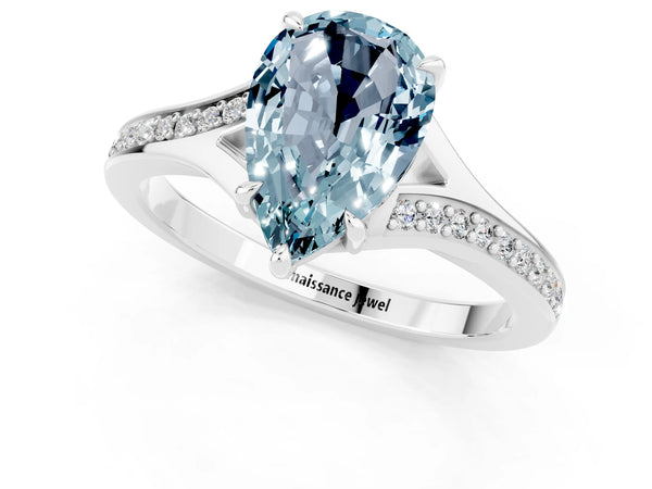 White gold Pear Cut Aquamarine Solitaire Ring with Pavé Band and Prong Setting