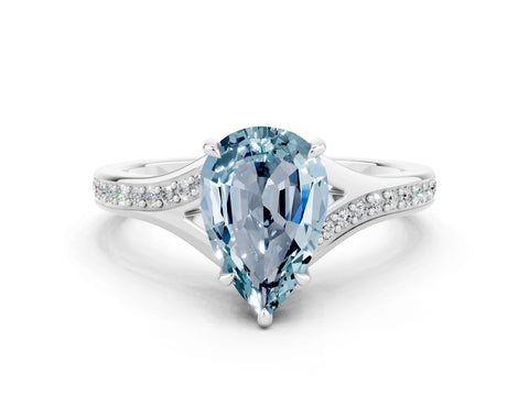 White gold Pear Cut Aquamarine Solitaire Ring with Pavé Band and Prong Setting