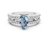 White gold Pear Cut Aquamarine Solitaire Ring with Pavé and Channel Set Band