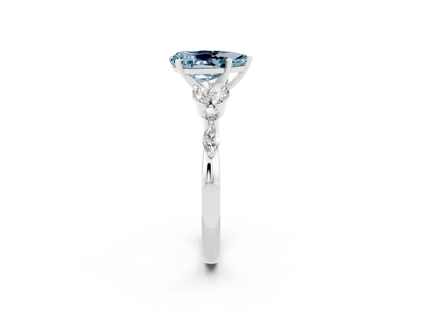 Platinum Pear Cut Aquamarine Solitaire Ring with Side Stones and Four-Prong Setting